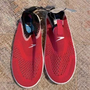 Speedo swim shoes. Brand new! Pink. Size 11/12